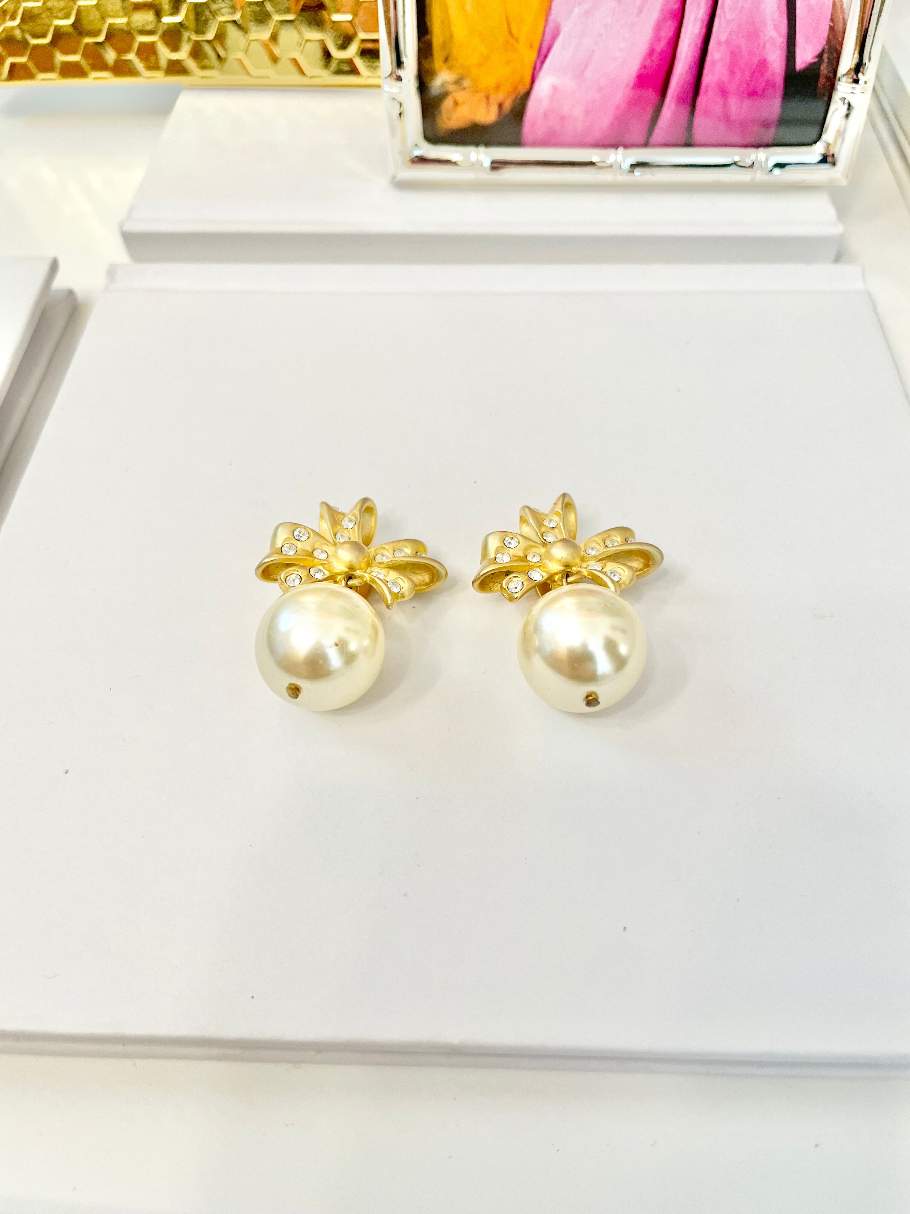 The charming gal loves only pearls! These drop earings are truly divine!!