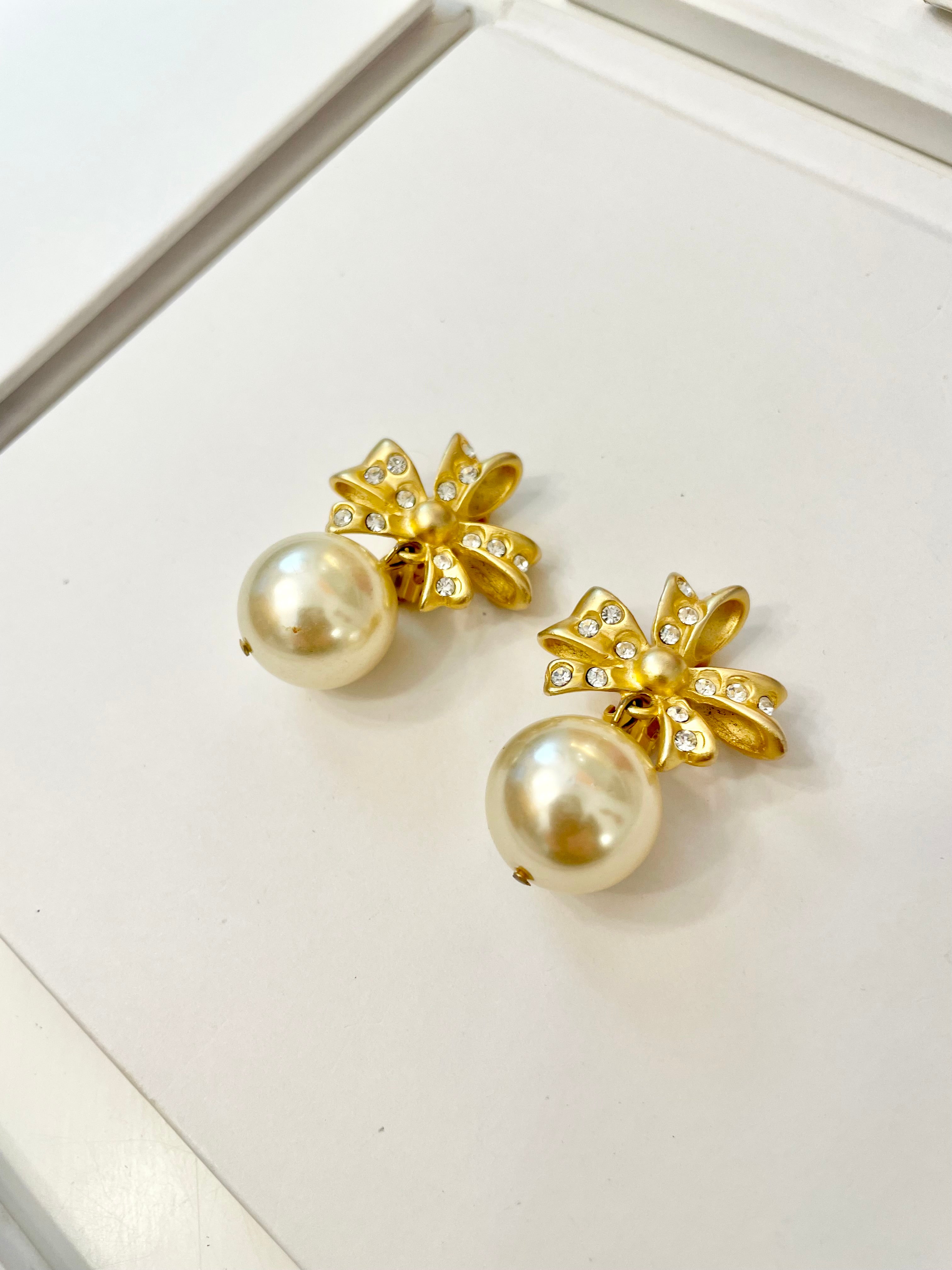 The charming gal loves only pearls! These drop earings are truly divine!!