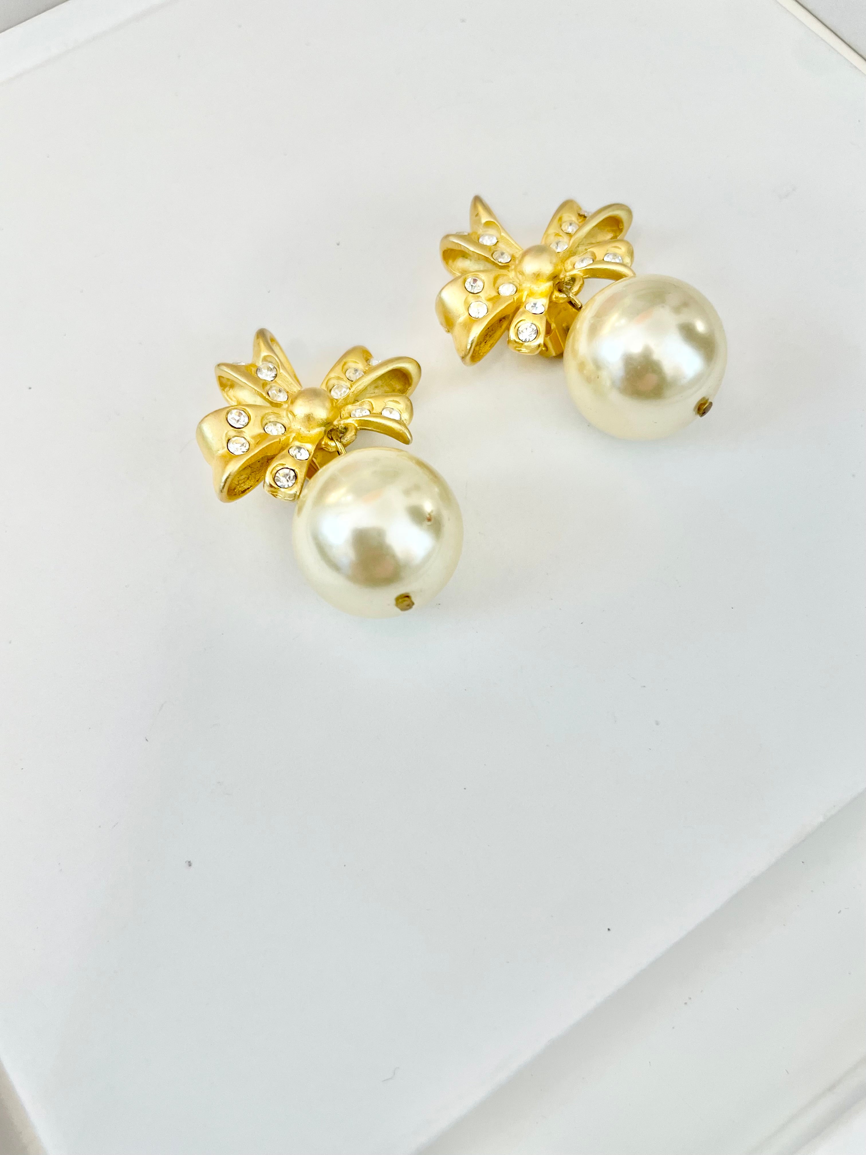 The charming gal loves only pearls! These drop earings are truly divine!!
