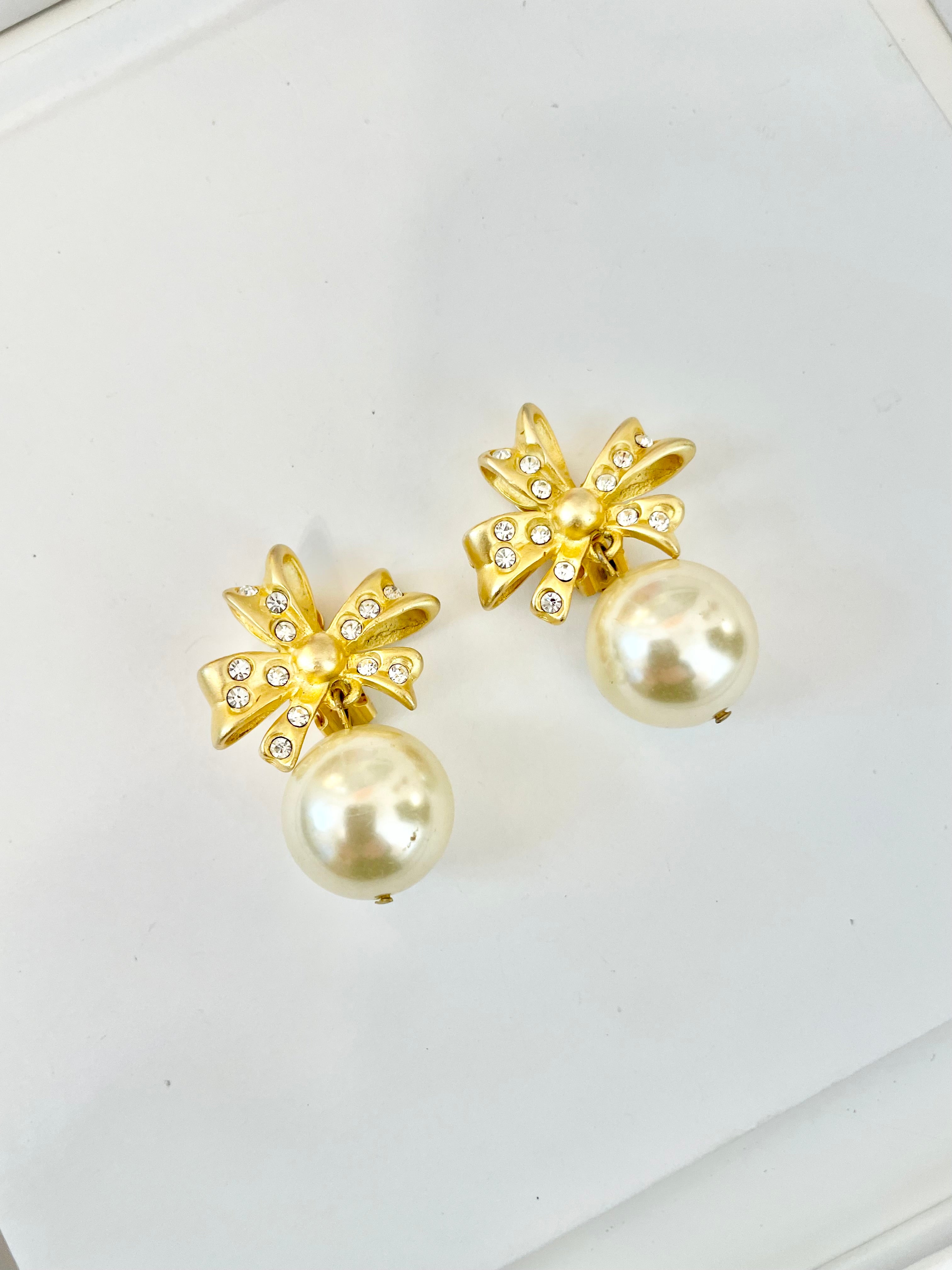 The charming gal loves only pearls! These drop earings are truly divine!!