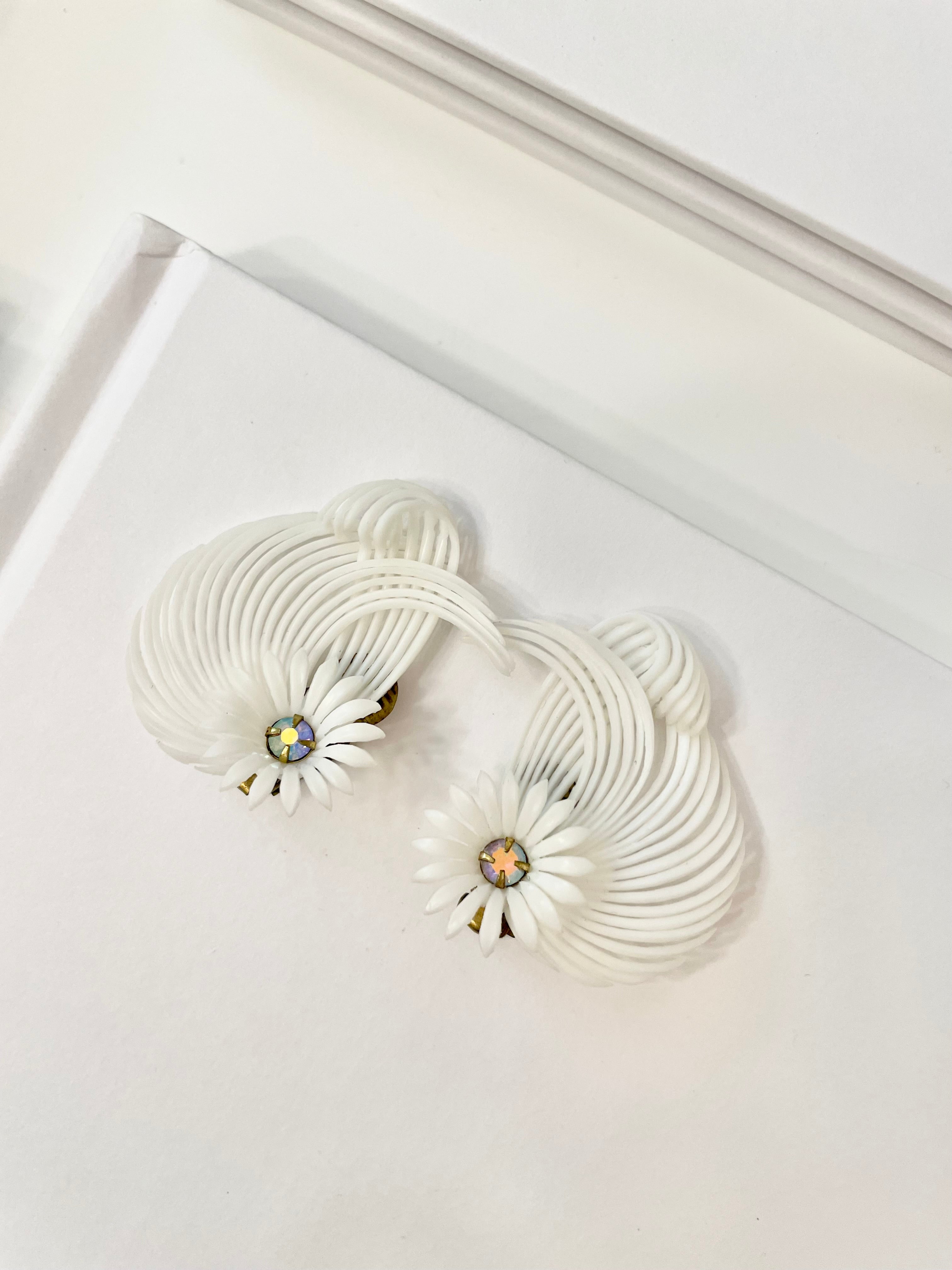 The Cheeky Mistress and her love of the unusual..these 1960's white fan style earrings are so chic!