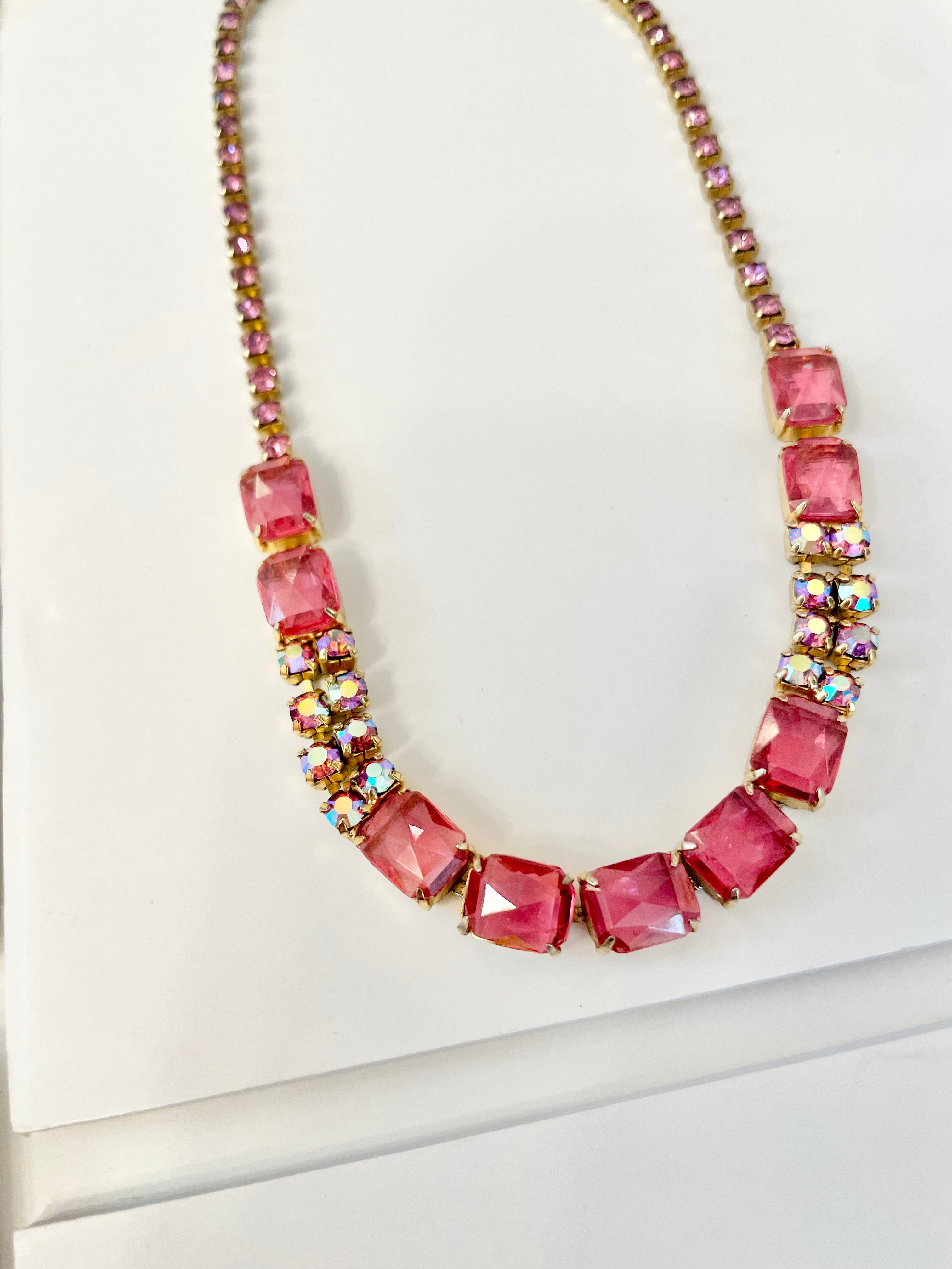 Flirty gal and her love of pink! This 1950's glass choker is truly divine!