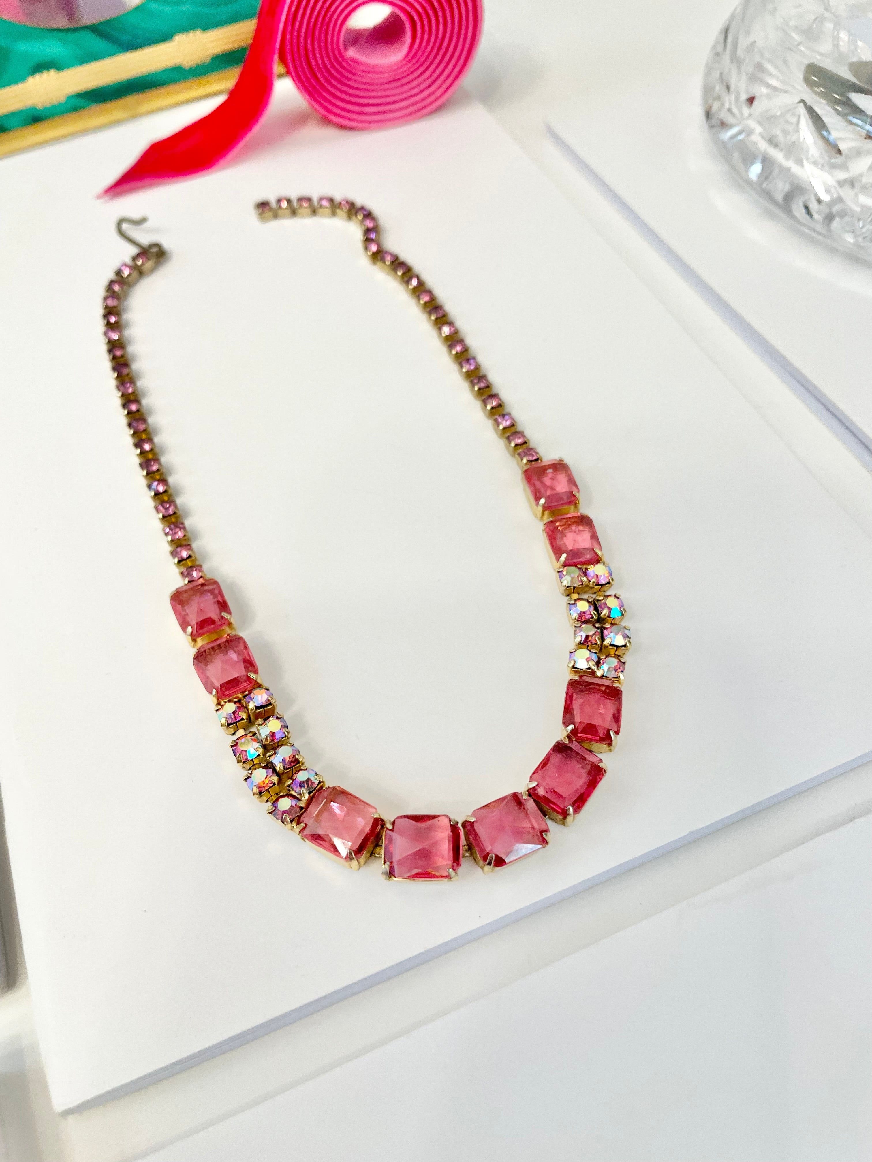 Flirty gal and her love of pink! This 1950's glass choker is truly divine!