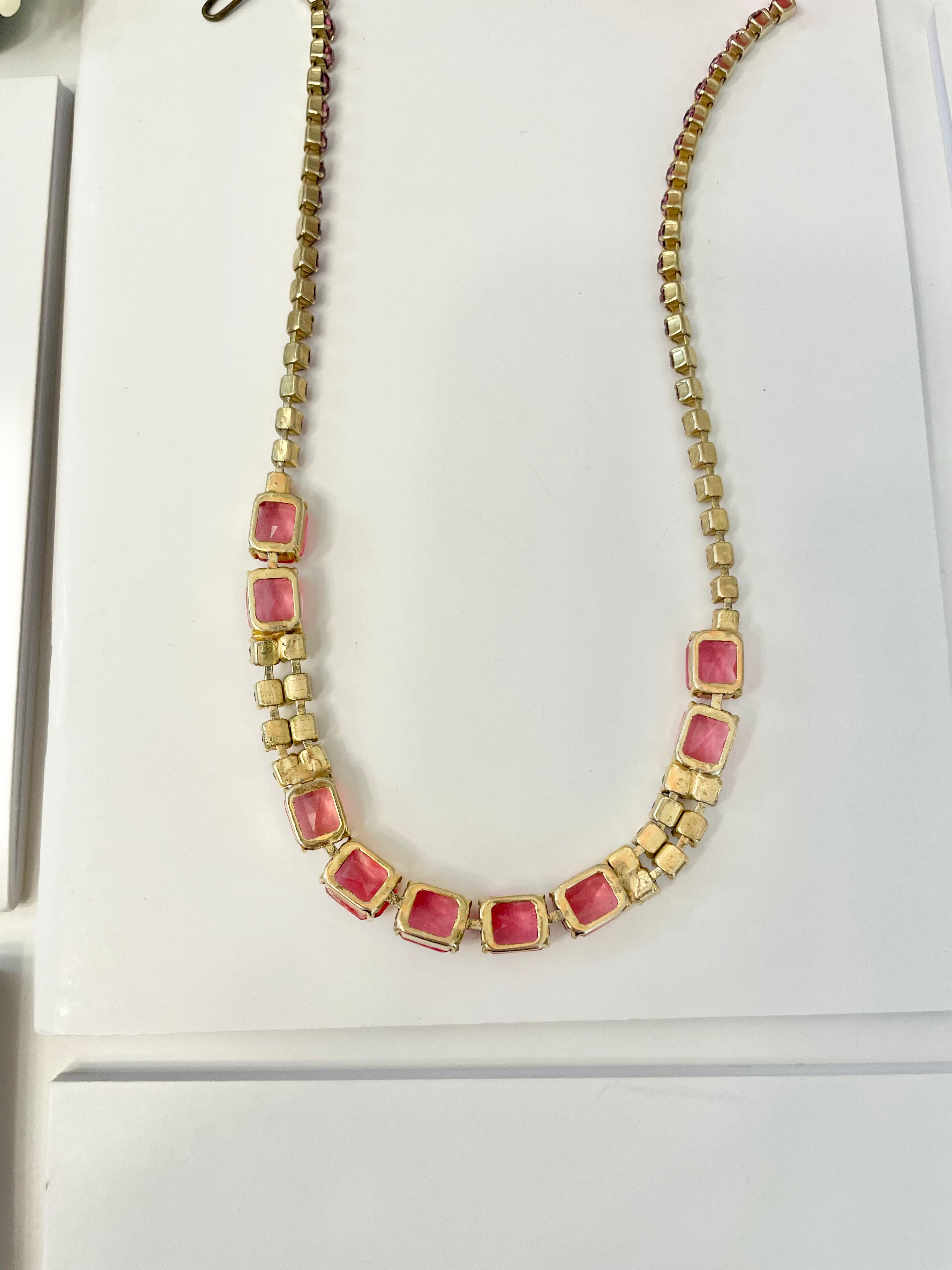 Flirty gal and her love of pink! This 1950's glass choker is truly divine!